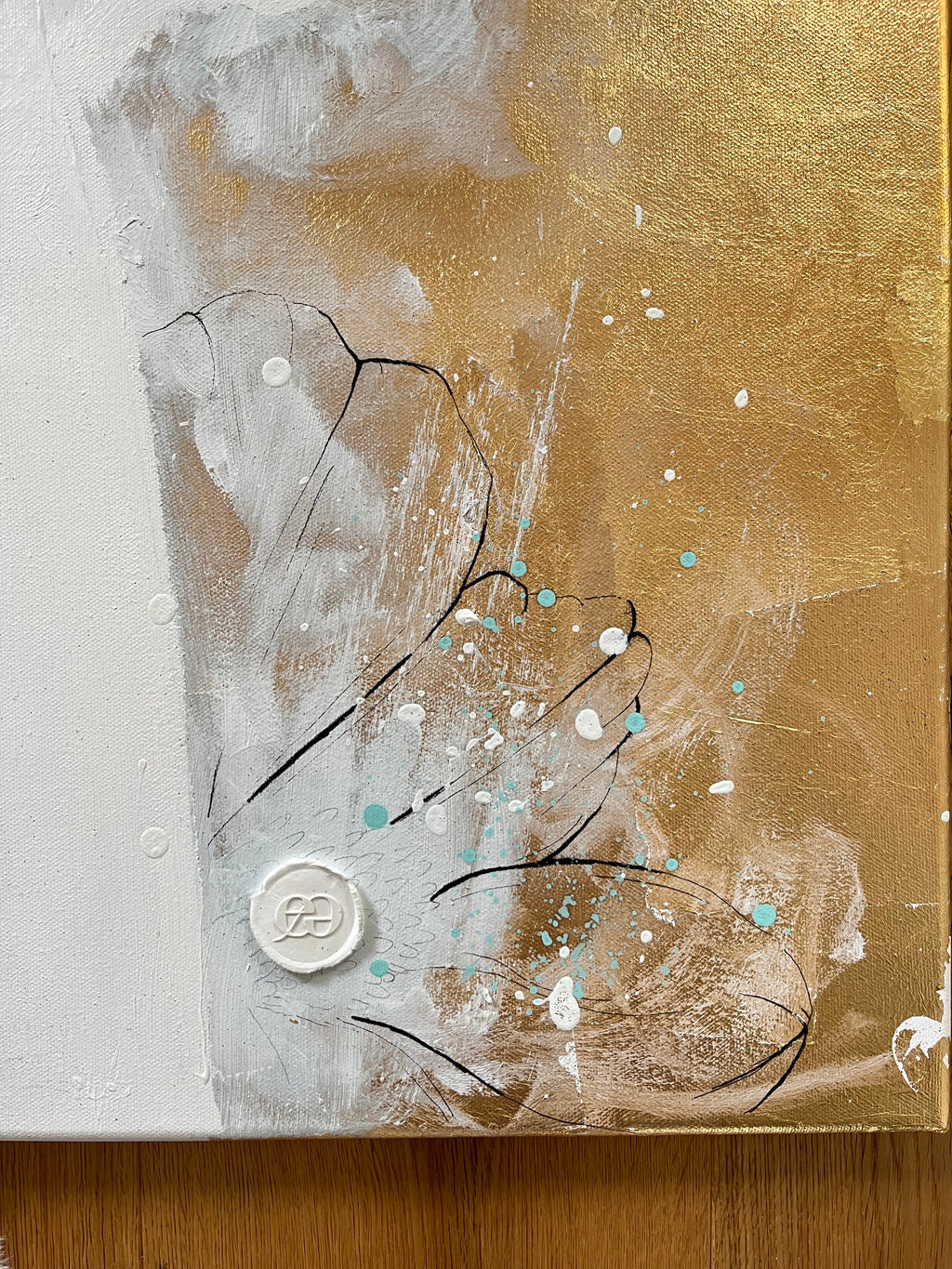 Detailaufnahme des fertigen Werks mit Logosigel.